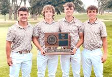 Trey Murray, Kade Stukel, Eli Fogel, and Luke Stukel won the second of back-to-back team golf championships in Watertown Monday and Tuesday last week. Three of the boys placed in the top ten, including a first place finish by Fogel. (Photo by Kellie Stukel)