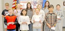Gregory American Legion Poppy Poster Winners are, back row, l to r: Parker Frasch, Gracelynn Lanz, Nicole Eagle Star, Aubree Opp, Lainey Dobson, and Boone Beck; front row, l to r: Caleb Collins, Izabella McIntyre, Milly Meyer, and Joe Braun. Not pictured: Brady Parkis, Emily Stevicks, and Heydan Westfall.