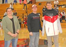 Coy Determan, member of the 2022 state champion golf team, was presented with a jacket from the Athletic Club during the Parkston game on February 3. In addition to the team title, Determan tied for first in the winning effort. The rest of the team received their jackets during coronation.