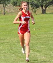 Emma Thomas crossed the line in first place with a time of 20:59.4 at the host invitational last Tuesday.