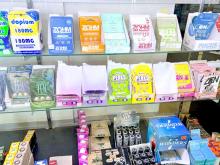 A variety of kratom and 7-OH products — including capsules, cartridges and wellness shots — are on display at a smoke shop in Buffalo, N.Y. States have led the way in regulating kratom, and now federal officials want to ban 7-OH, a powerful compound found in some kratom products. (Photo by Amanda Hernández/Stateline)