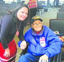 Rosebud Tribal Councilwoman Lisa White Pipe is shown here with Donald Loudner, a Korean Veteran of the Hunkpati Dakota Sioux Tribe, who serves at the National Commander of the NAIV. He was presented with the NAIV Charter at the National American Indian Veterans Charter Signing Ceremony.