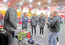 Gregory High School students visit the Gregory Ambulance Service’s table at the career fair sponsored by Gregory Economic Development Group on Wednesday, February 12, 2025. (Photo by Shelby Jones, Gregory Times-Advocate)
