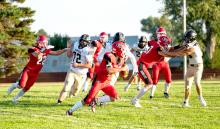 Quarterback Lincoln Juracek had a solid passing game Friday night, connecting on 8 of 16 attempts for a total of 118 yards, two touchdowns, and five first downs. (Photo by Calli Jo Photgraphy)