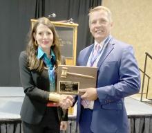 George Johnson of Johnson, Pochop & Bartling Law Office was elected president of the South Dakota Trial Lawyers Association at the annual meeting of the SDTLA on June 22 during the State Bar Convention. He is shown here with Melissa Nicholson Breit of Nicholson Law Office, the outgoing president, passing him the gavel.