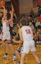 Carson Klundt goes up for a jump shot against MVP.
