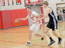 Jacob Klein outmaneuvers his opponent in the Gorillas’ loss to MVP last Tuesday. (Photo by Maya Hull)