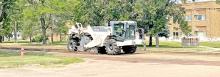 Atteberry Construction is expected to complete milling the streets undergoing resurfacing by the end of the week. The final layer of rock chipping will be done in August.