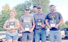 Winners of the Monster Arm Wrestling tournament are pictured front row, from l to r: Emily Anderson (women 40 and under champion), Jordan Vosika (mens 40 and under light weight champion), Clay Beck (mens 41 and over heavyweight champion), and Ted Stevicks (mens 40 and under middleweight champion). Back row Grant Bevins, (heavyweight champion 40 and under). Not pictured is Crystal Vomacka (women 40 and over champion.