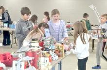 Elementary students shop ‘til they—or the volunteers—drop