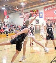 Colt Keiser shoots over a Platte-Geddes defender in Monday’s 51-45 win over the Black Panthers in a make-up game at home. More results for this game will be in next week’s Gregory Times-Advocate. (Photo by Madi Graber)