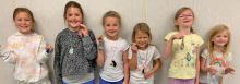 Participants make their our jewelry during 4-H workshop held last week of May