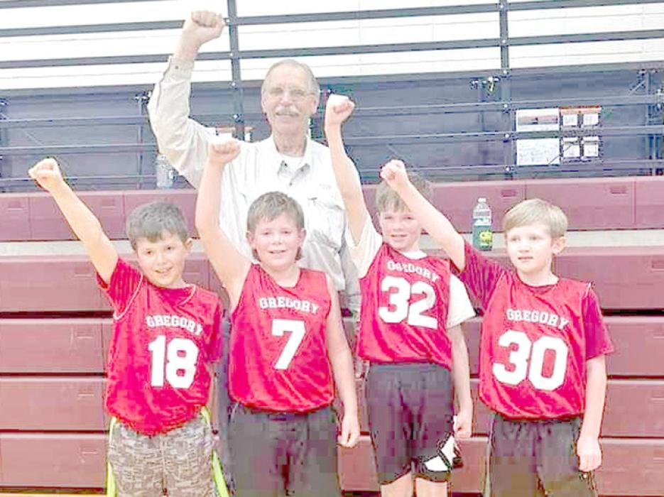 In the second and third grade division, Gregory teammates consisting of l to r: Sawyer Sperl, Sully Sperl, William Bolander, and Caleb Collins, and earned a Championship Title. Sully made a free throw in the last game to claim the victory. They were coached by John Malm.
