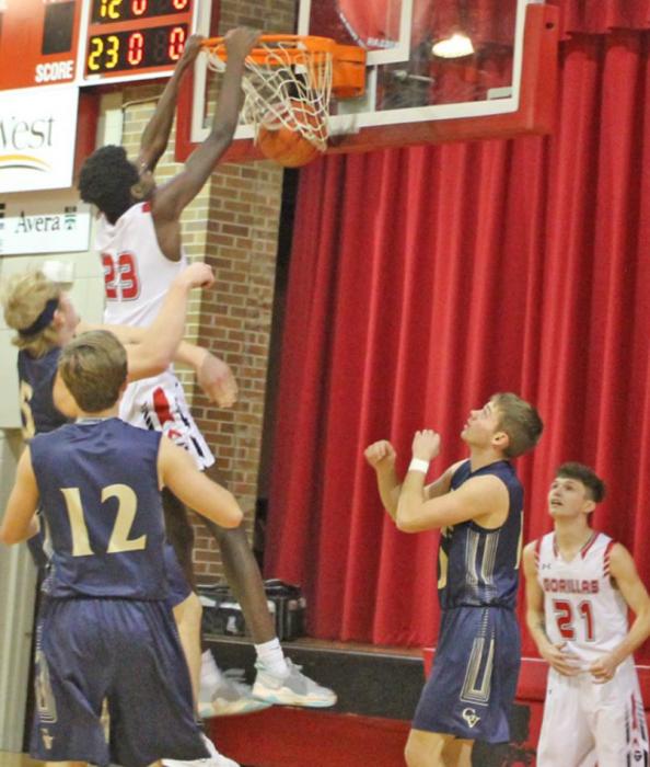 Dunks, 3-pointers, lay-ups: he does it all. Not only did Daniel Mitchell lead the team with 16 points against Kimball-White Lake on Thursday, January 20, he also became the latest Gorilla baller to add his name to the 1000 point roster. (Photo by Jordan Svatos)