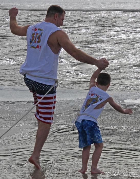 Steve and Jack Hergott, a father/son duo, make the plunge for the first time. Jack is six years old. He was crowned Polar Bear Prince, for being the youngest jumper.