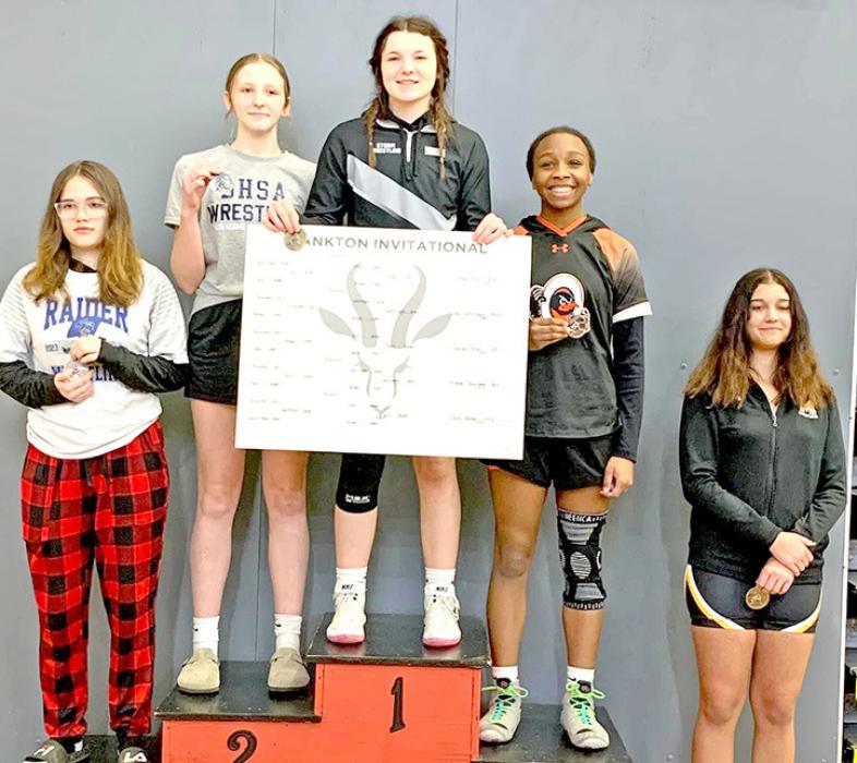 Daytona Paris, center, was one of the Burke/Gregory Storm’s first two female wrestlers.