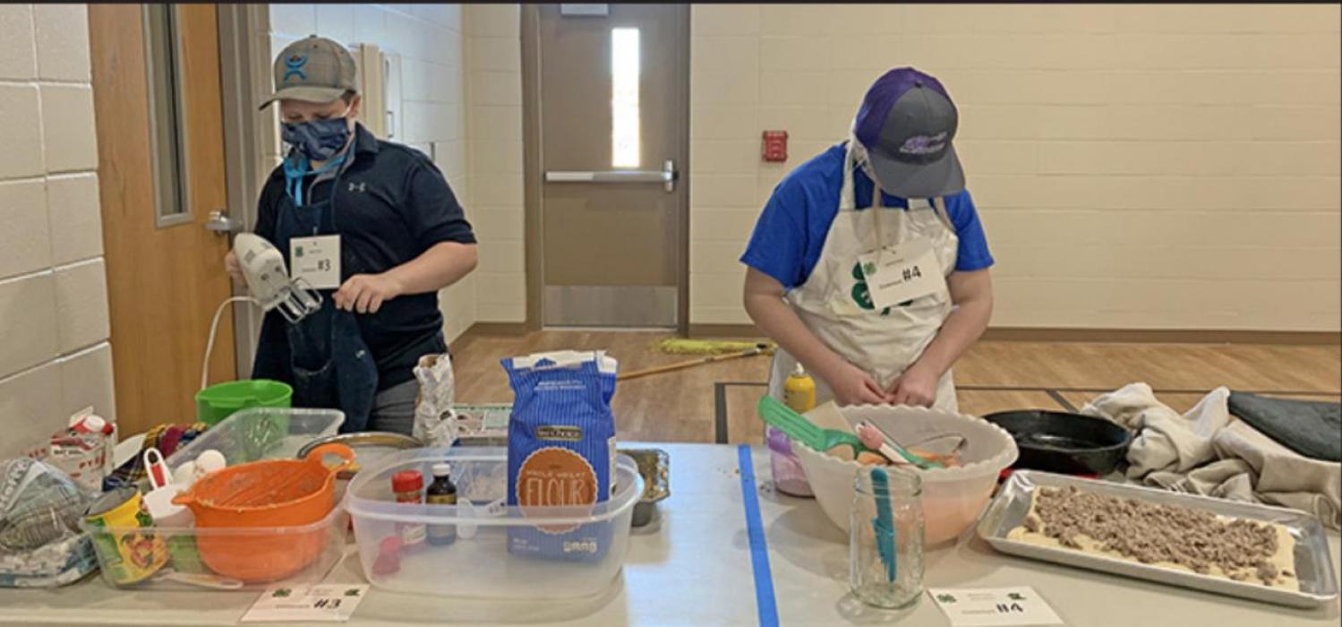 Jaxon Sargent and Kyrie Matucha preparing their dishes.