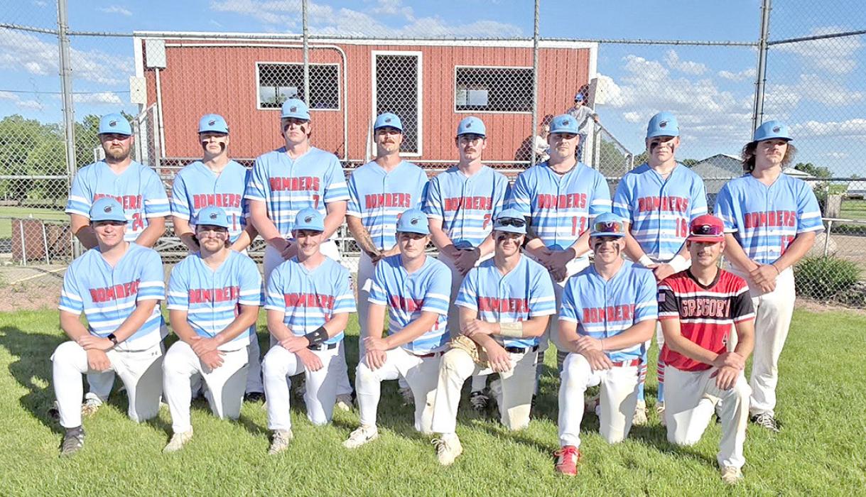 The 2026 Burke Bombers are, back row, l to r: Coach Blake Hoffman, Beau Keith, Hunter Van Niewenhuyse, Riggin Temple, Blake boes, JJ Farner, Kade Braun, and Rhoss Oliver; front row, l to r: Coy Determan, Brogan Glover, Ben Witt, Jad Leber, Aaron Sundquist, Gannon Thomas, and William Hemming. Not pictured: Christian Schweigert and Sawyer Tietgen.