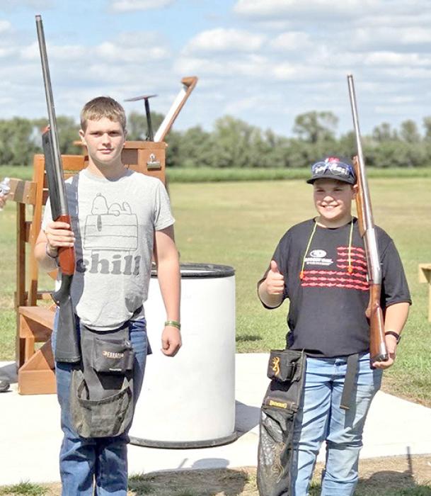 Jaxon Sargent, l, and Connor Atteberry, r, qualified for and competed in the 4-H State Fall Shoot earlier this month.