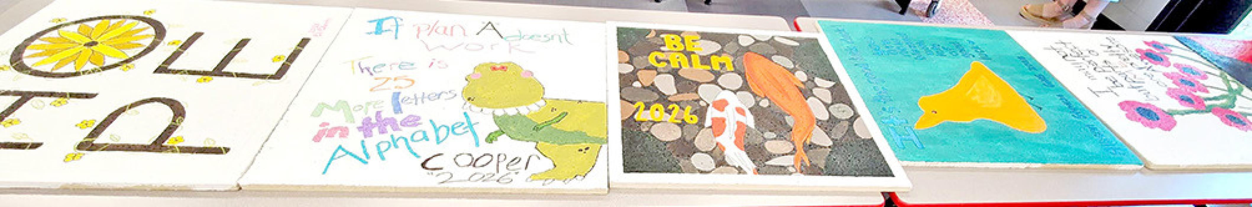 Decorating ceiling tiles was a favorite project for many of the art students this year, and the students were involved in the decision as to where the tiles will be located throughout the school.