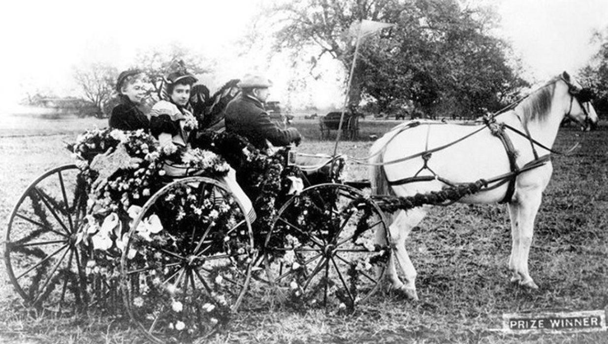 Today’s floats have come a long way from the original parade entries of horses and carriages covered with roses.