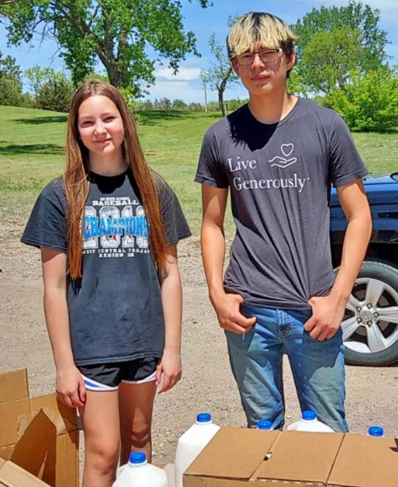 Youth helping distribute food