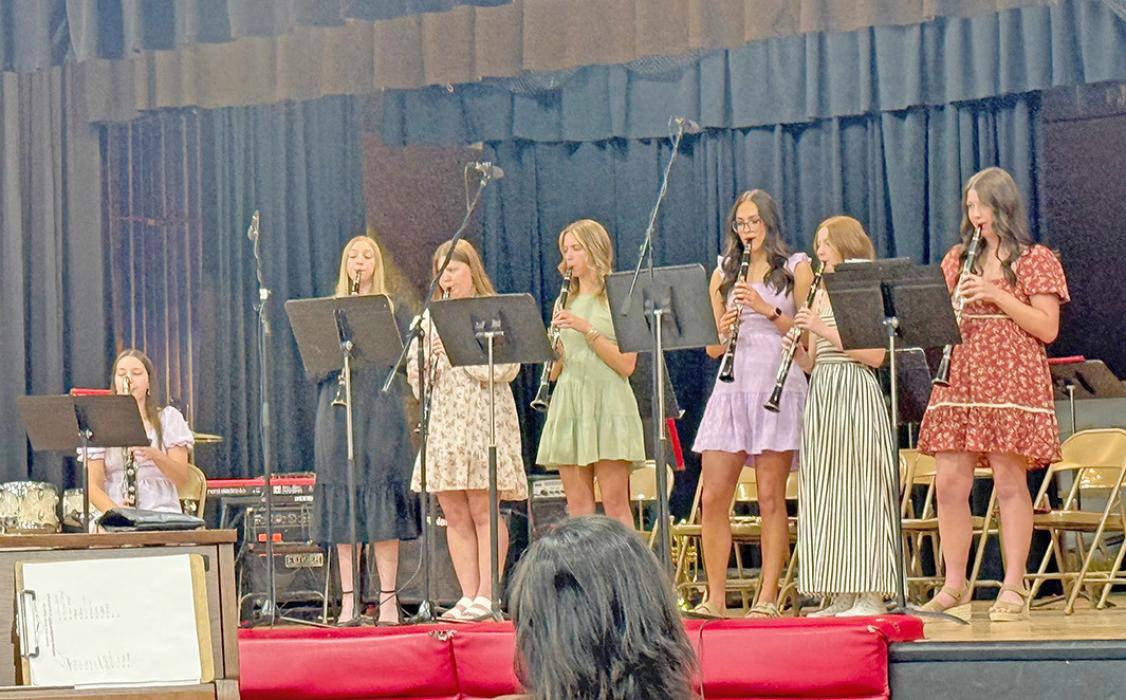 Clarinet choir: Kaelynn Rezac, Jerilee Hanson, Emily Grim, Addy Stukel, Aubree Miller, Mia Haines, Ella Sperl perforfed Suave by Kate Agioritis.