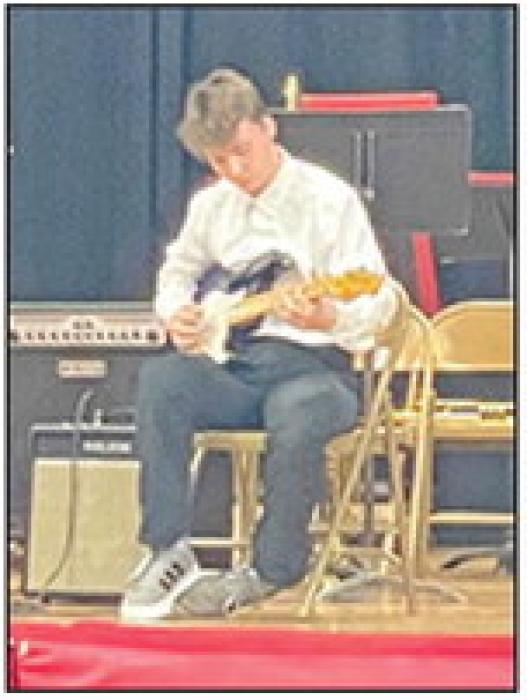 Bentley Samuel performed Nutshell on guitar. (Photo by Kristi Ring)