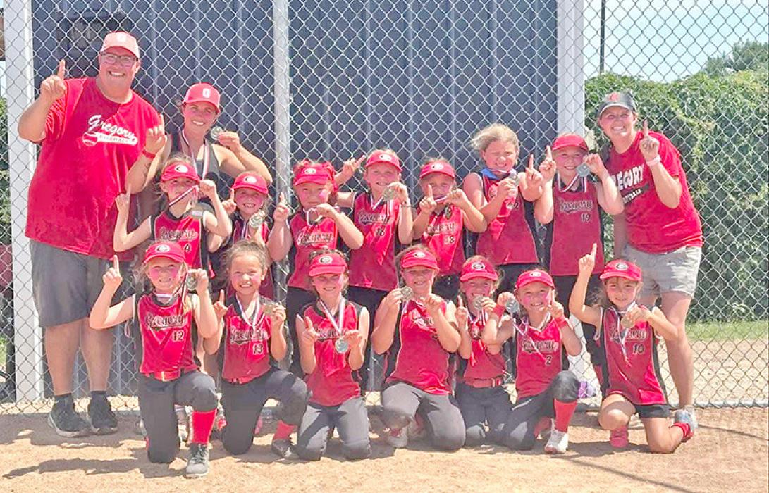 The Gregory 8U softball team members are front row, l to r: Eleanor Springer, Kaleea O’Connor, Jessa Bartling, Bria Opp, Elliott Thomas, Finley Frasch, and Ana Sundquist. Back row, l to r: Coach Jared Opp, Coach Shannon Lunne, Ellie Sedlacek, Conroe Lunne, Aspen Joiner, Kendall Braun, Kitana O’Connor, Havorly Heyden, Everly Veskrna, and Coach Katie Opp.