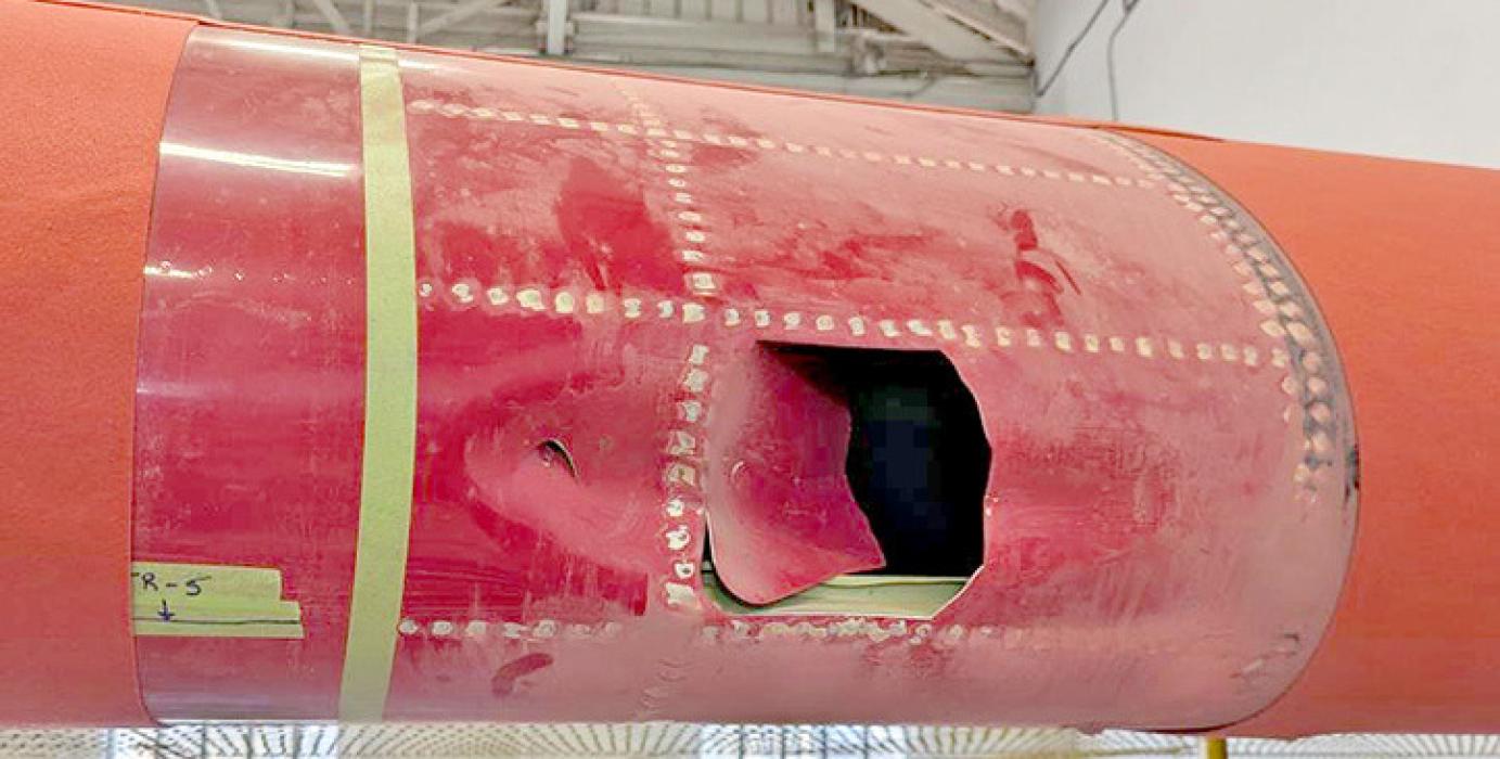 An unauthorized drone flying in violation of a temporary flight restriction (TFR) area on January 9, 2025, collided with a firefighting aircraft. The aircraft, commonly referred to as a “super scooper,” was conducting fire suppression operations at the Palisades Fire near Malibu, California, and was able to land safely. The collision left a 3-inch by 6-inch hole in the left wing. (FBI photo)