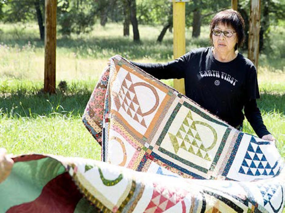 Wilma also makes quilts with other traditional designs besides the star quilts. (Photo from Quiltfolk, used with permission)