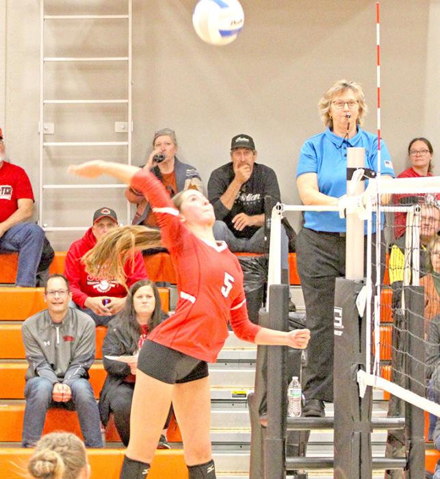 Regan Graesser is ready to spike the ball. (Photo by Sara Anderson)