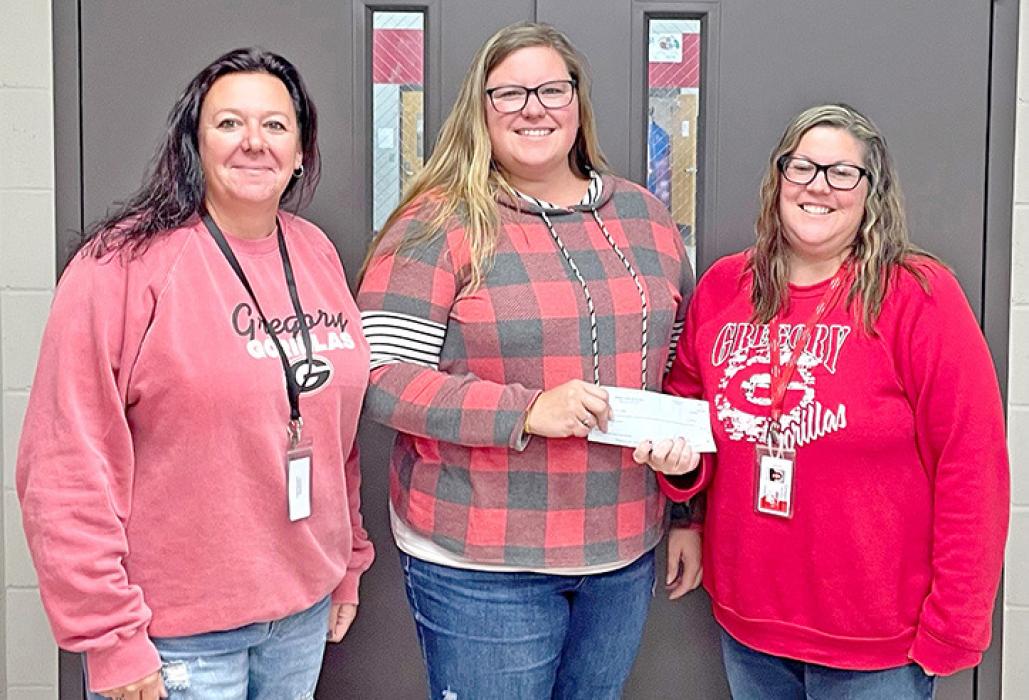 Alisa Schmitz Noble Grand of the 100F Lodge presented the checks to members of the Pink Ladies. Pictured from l to r: Kate Schrader, Anna Matucha, and Alisa Schmitz.