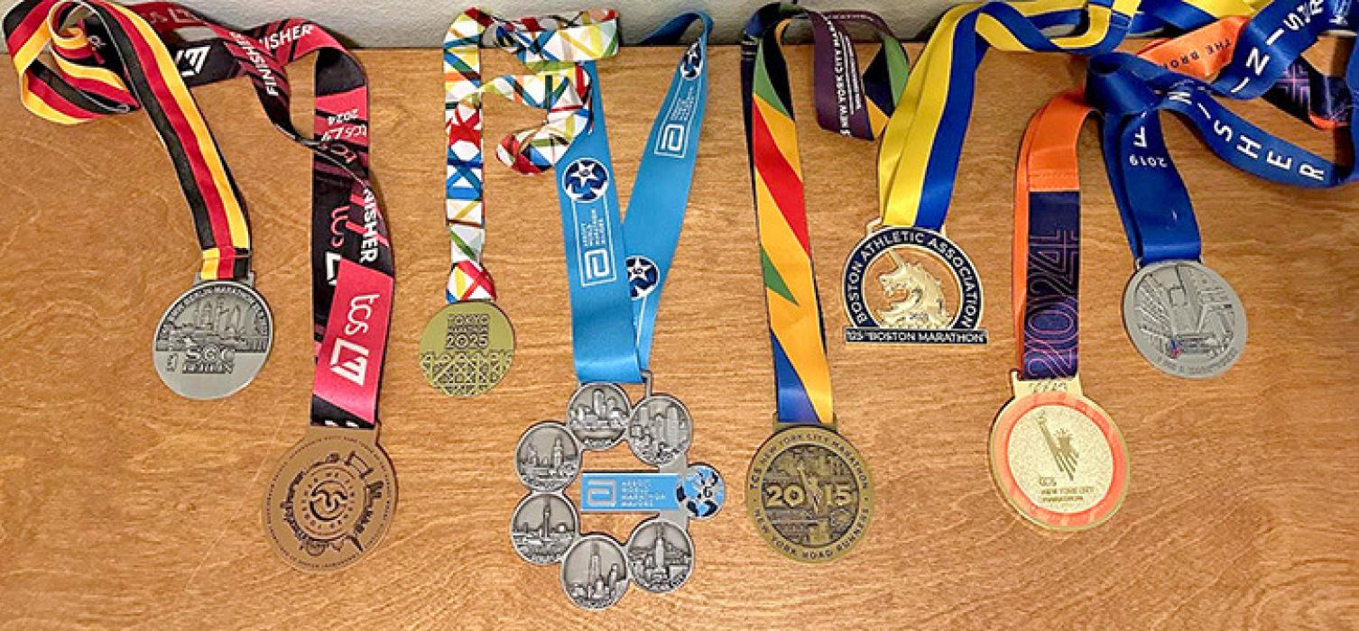 Medals from the six major marathons are shown here with the Six-Star Abbott World Major medal in the center. Two of the medals are from the New York Marathon, which Wade ran twice. (Submitted photo)