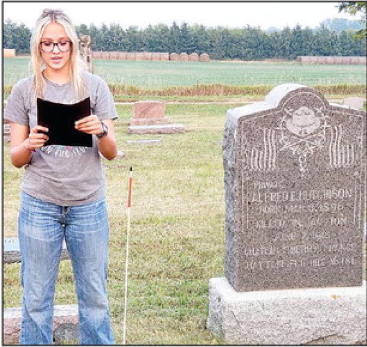 Aubree Miller recounted the life of PFC Alfred Hutchison, after whom the Gregory American Legion Post is named.