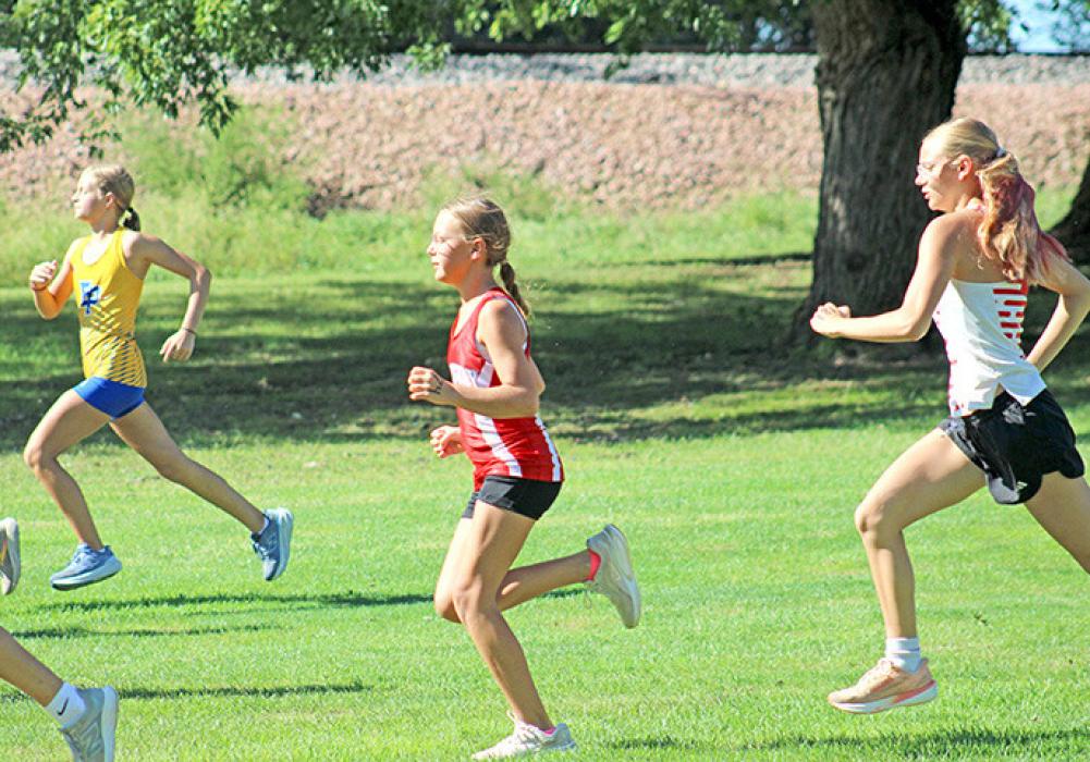 Sutton Braun, a 7th grader, ran the varsity race, finishing 29th. (Photos by George Timanus) by Coach Lonnie Klundt