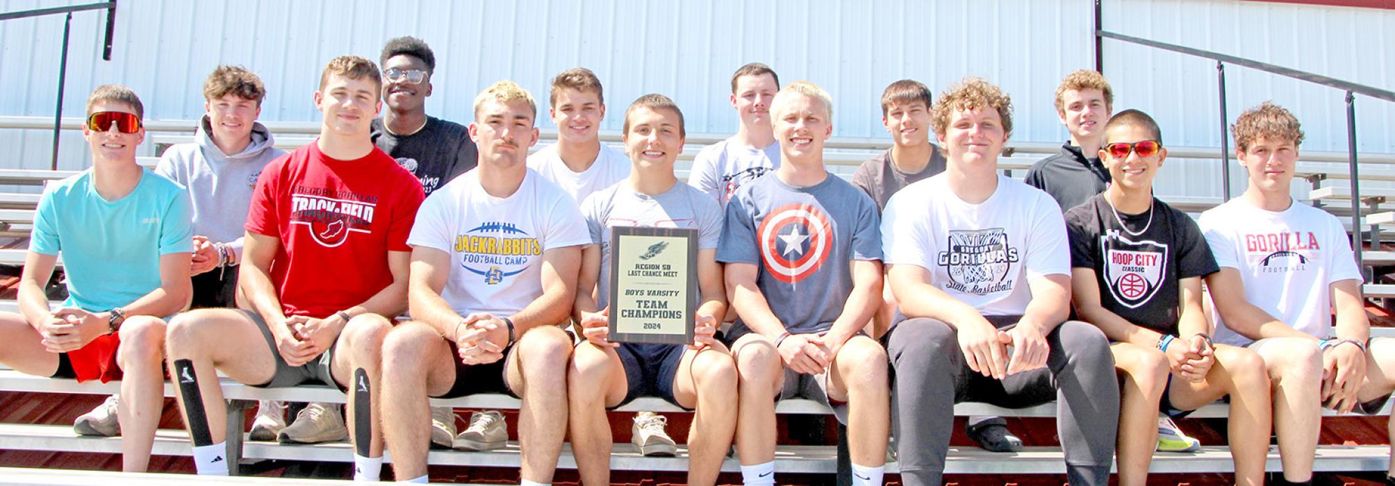 Shown with their first place plaque from the region track meet are members of the boys team, shown back row, l to r: Pierce Stukel, Daniel Mitchell, Trey Murray, Cruz Klundt, Noah Bearshield, and Ryler Stevicks; front row: Fin Adams, Max Cook, Jhett Eklund, Luke Stukel, Paul Sinclair, Rane Kenzy, Lucas Barreto, and Jess VanderPol. (Photo by Katie Bolander)