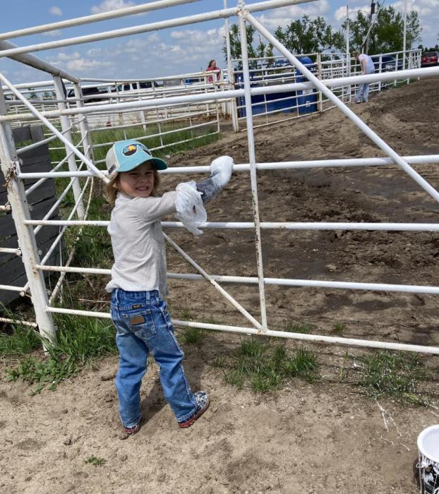Liam Sutton is helping with upgrades and painting of the rodeo grounds getting ready for the Burke Stampede Rodeo in July.