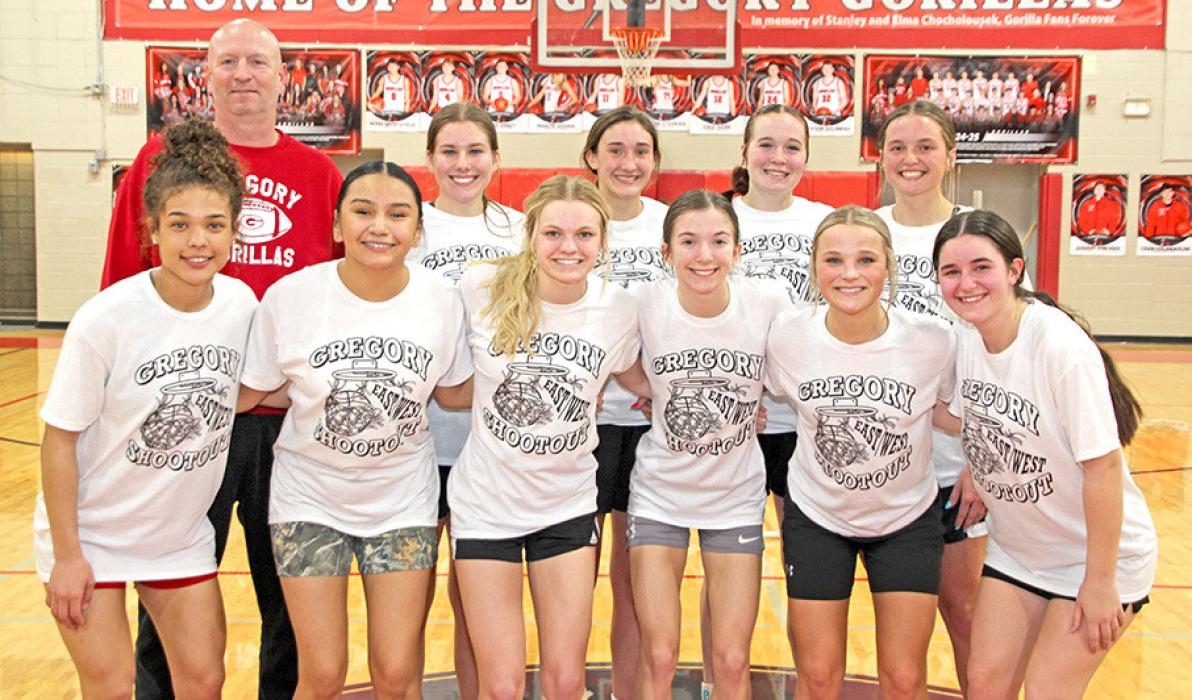 The girls East team consisted of back row, l to r: Coach Jeff Determan, Maya Thuringer (Platte/Geddes, 2 pts), Kenadee Kozak (Bon Homme, 12 pts), Lydia Yost (Wagner, 8 pts), and Lindy Kiehn (Kimball/White Lake, 8 pts). Front row, l to r: Leah Brown (AC/DC), Mahpiya Irving (AC/DC, 16 pts), Josie Brouwer (AC/DC, 12pts), Lauren Ziebert (Parkston, 8 pts), Summer Skluzak (Kimball/White Lake, 7 pts), and Kalli Summerville (Platte/Geddes).