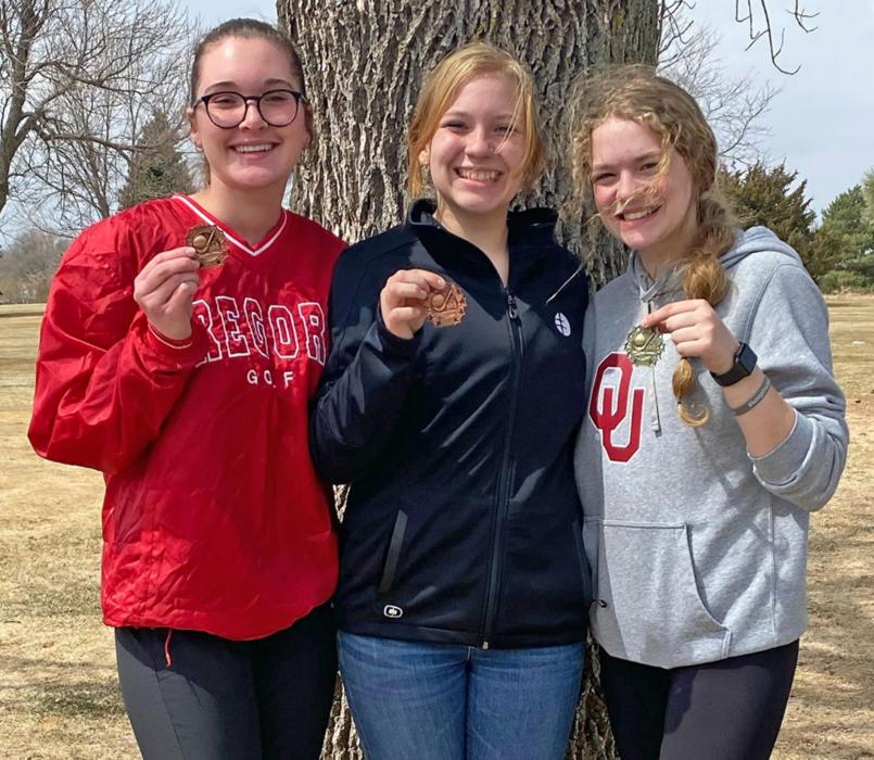 All three girls on Gregory’s junior varsity golf team earned medals at their home meet on April 12. Shown left to right, Gabby Jung shot a 57 to place seventh, Lily Jacobsen came in 11th with a 60, and Kaydence Klein won the tournament with her 49. (Submitted photo)