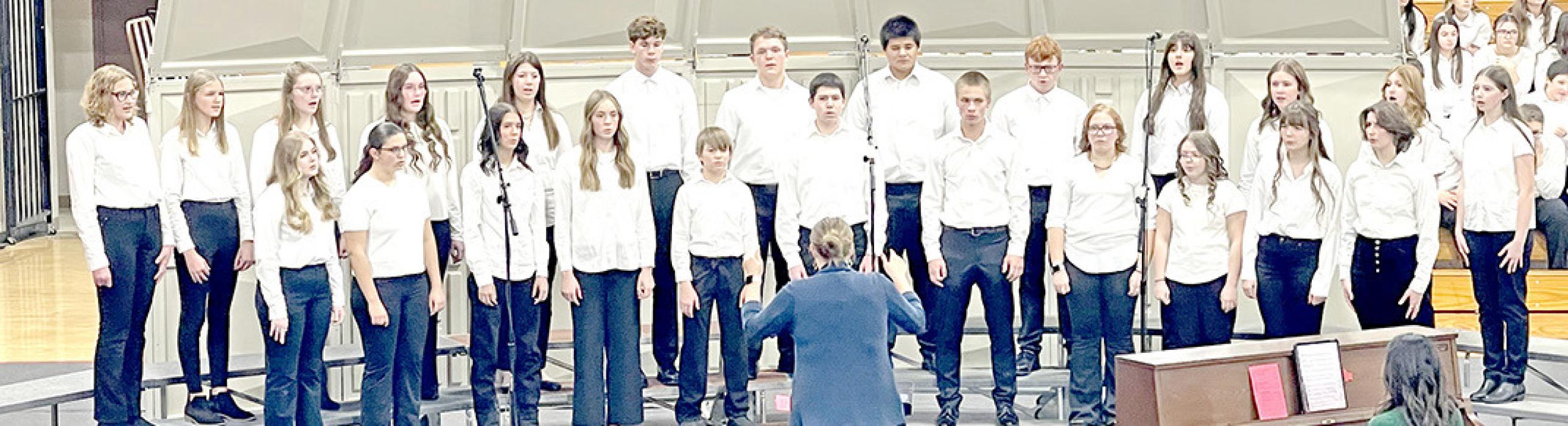 8va performed Jingle Bell Rock and There Is Faint Music. (Photo by Sara Anderson)