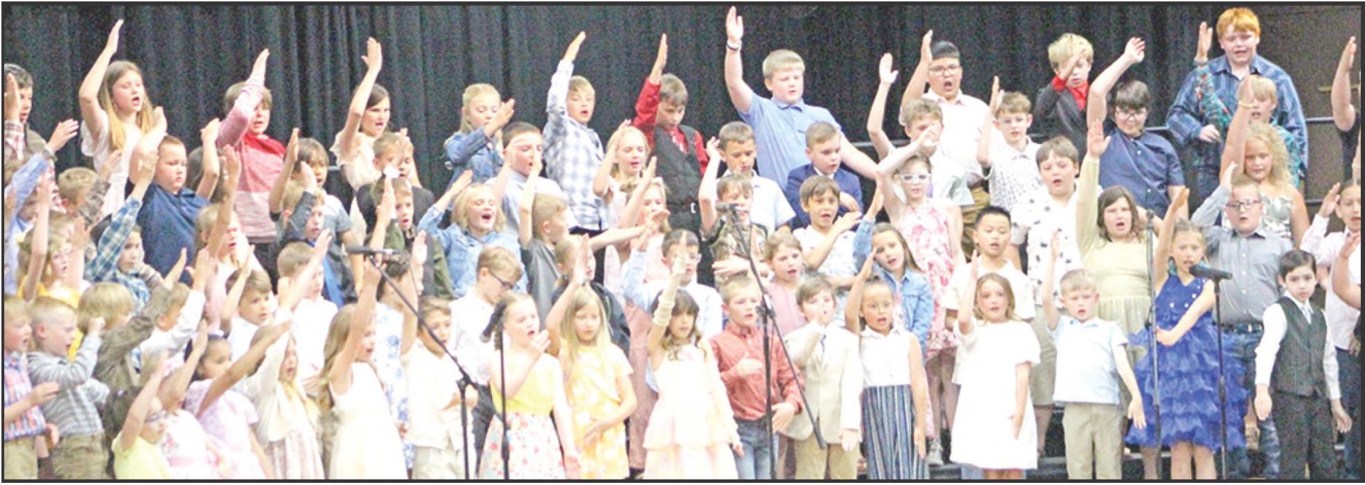 The 1 st-3rd grade students presented the program “The Principal and the Pea, ” which featured several selections including “Food Fight,” “They Never Ask the Kids,” and “Peas.”
