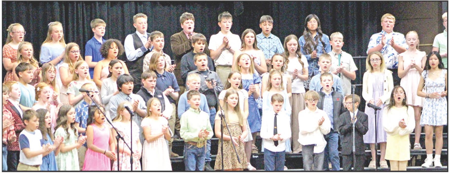The 3rd and 4th grade students performed “Meet Me at the Fishin’ Hole” and “Tomorrow Needs Us.”