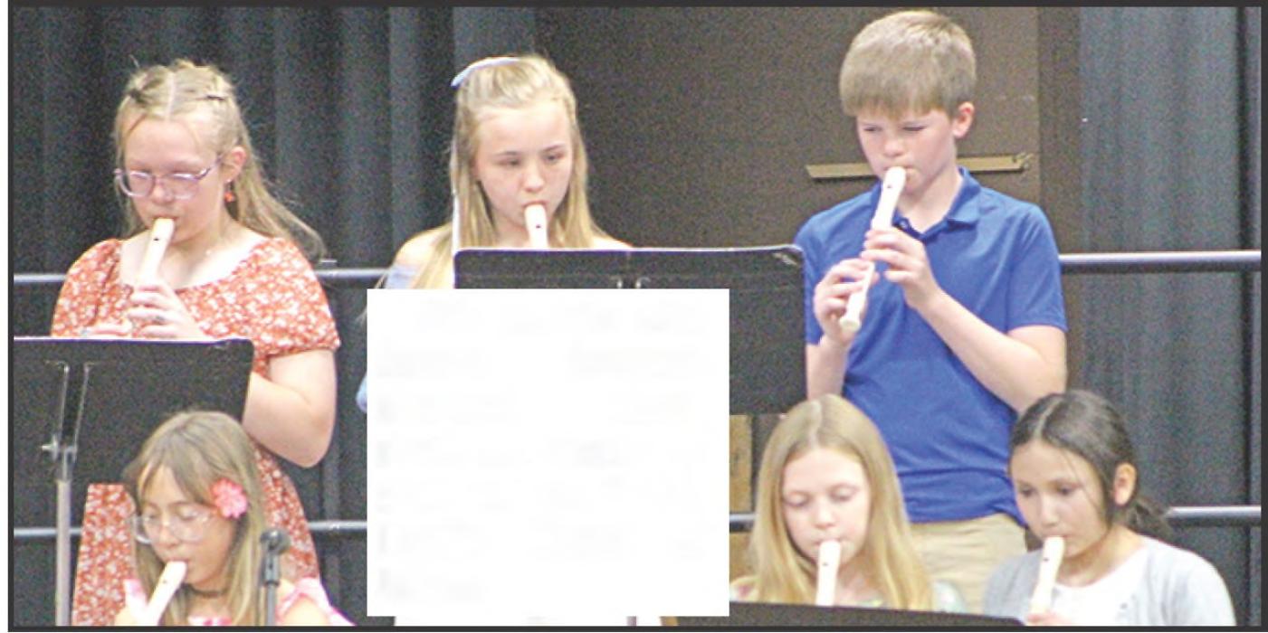 4th grade students demonstrated their skill on their recorders on “This Little Light of Mine.”