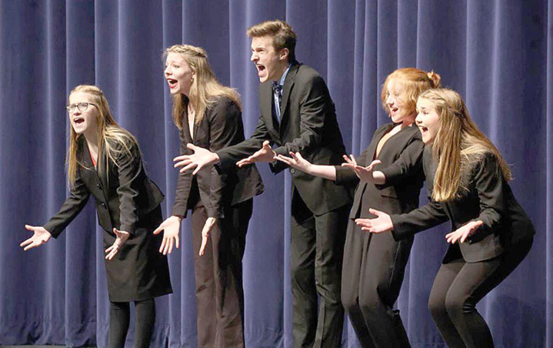 The Brandon Valley Reader’s Theatre team performs “How to Eat Like a Child” from the PAC main stage of the PAC Friday evening, Dec. 2. The group won a superior for their humorous look at life through the eyes of a child. (Photo by Jeremy Waltner/for SDPB)