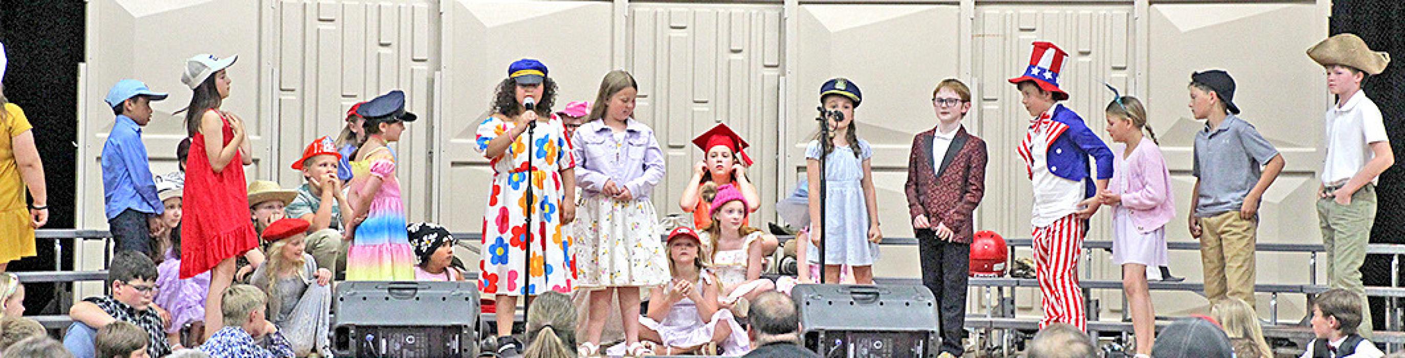 First-third graders concluded the concert with Hats, several fun selections with lots of speakers and soloists. (Photo by Ashley Lozano)