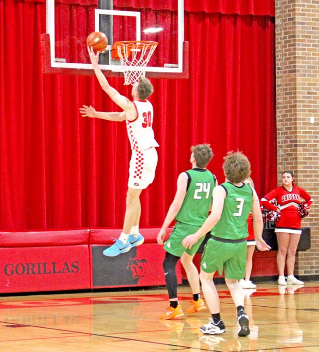 Colt Keiser goes to the upper deck as Miller players can only watch. (Photo by Maya Hull)