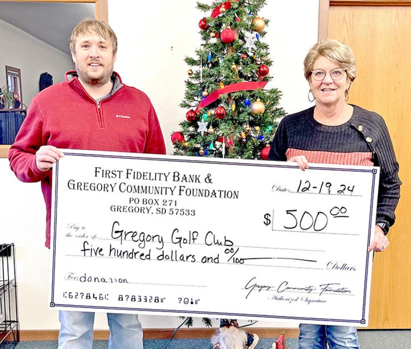 The First Fidelity Bank and Gregory Community Foundation awarded a $500 grant to the Gregory Golf Club for repairs to the teebox on holes 6 and 8.