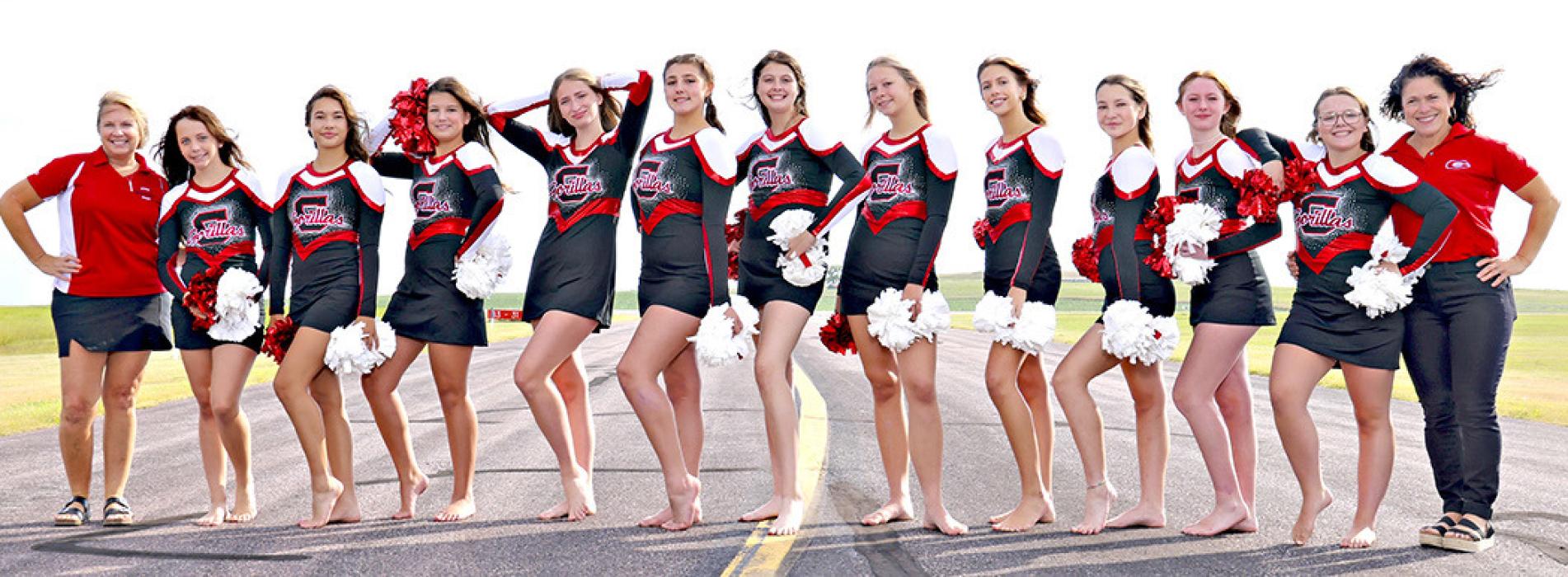 The 2024 cheer and dance teams include, l to r: Head coach Lenna Braun, Abigail Holmes, Kennley Sedlacek, Hadley Braun, Addison Anderson, Savanah Lozano, Adrianna Ziady, Miley Janak, Adyson Stukel, Kaelyn Rezac, Mia Haines, Madisan Graber, and assistant coach Jenny Hansen. (Photo by Prairie Portraits - Shelley Heath)