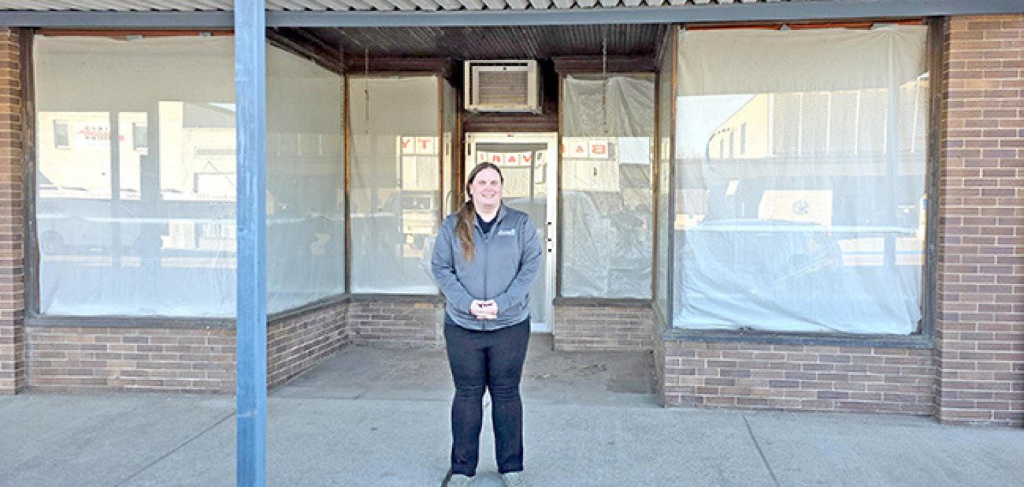 Jamie Thompson stands in front of her new business, Gregory PopUp Book Shop, slated to open March 1, 2026.